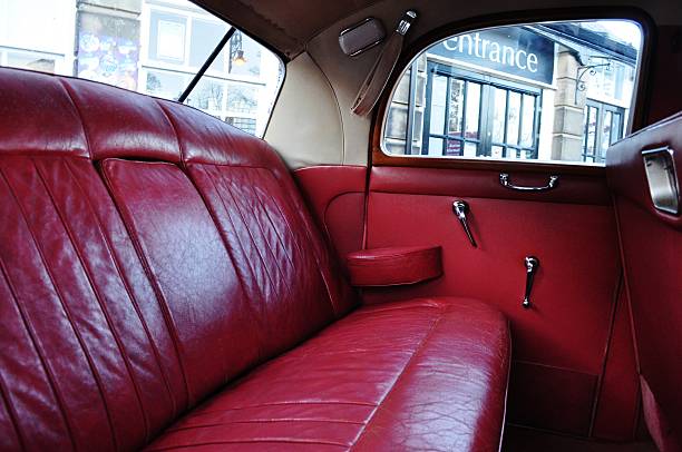 istock red leather car interior driving hobby 490996790