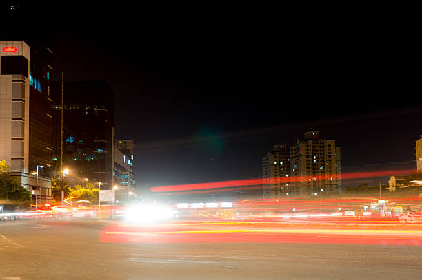 istock Modern building in Gurgaon with light trails 490999184