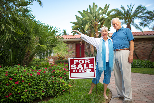 Senior couple selling their big house, and they are happy to move on.