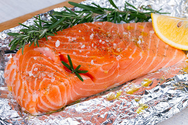istock Fresh salmon ready for cooking on the foil paper 491020178