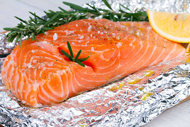 istock Fresh salmon ready for cooking on the foil paper 491020212