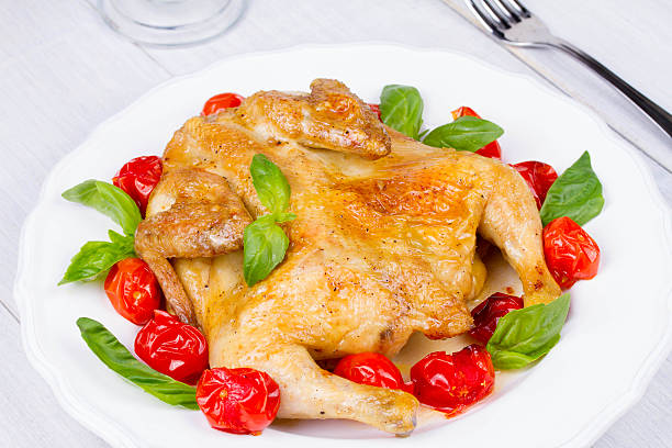 Whole roast chicken with tomatoes cherry