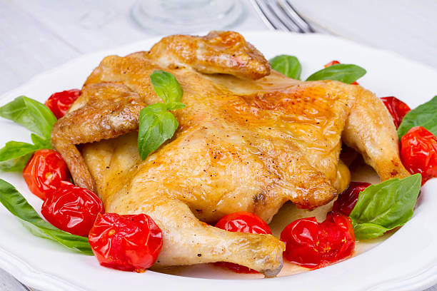 Whole roast chicken with tomatoes cherry