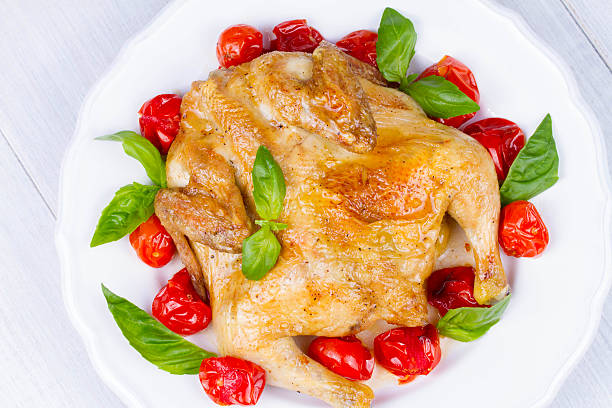 Whole roast chicken with tomatoes cherry