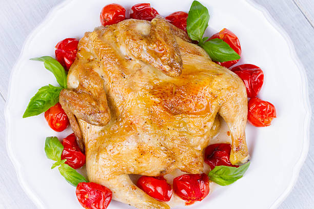 Whole roast chicken with tomatoes cherry