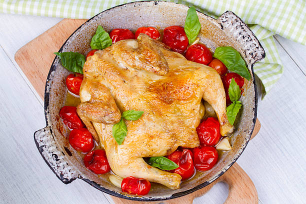 Whole roast chicken with tomatoes cherry