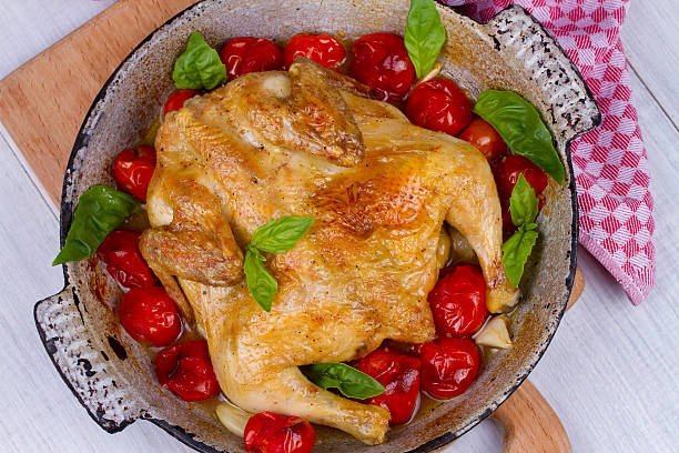 Whole roast chicken with tomatoes cherry