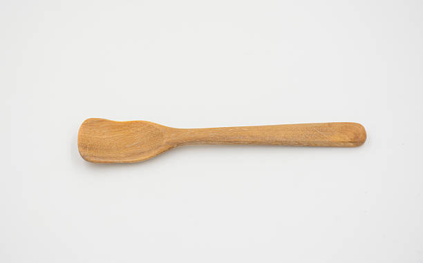istock Old wooden spoons and stirrers 491024748