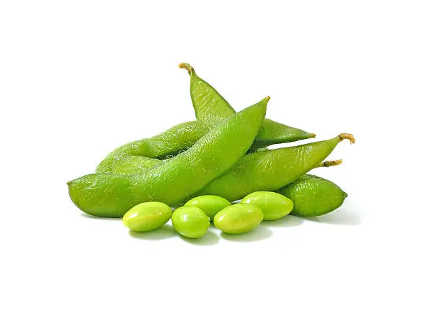 boiled green soy beans, japanese beans on white background