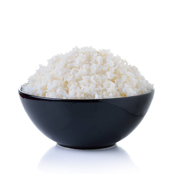 istock Rice in a bowl on a white background 491049400