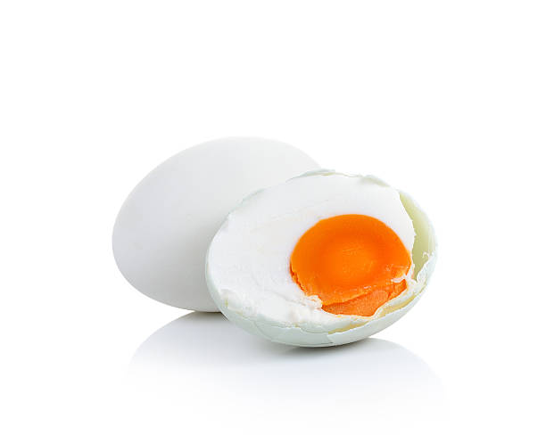 conservado pato egg sobre fondo blanco - salted fotografías e imágenes de stock