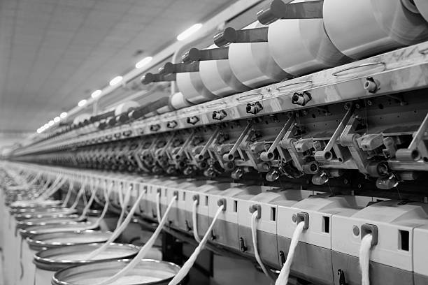 istock Cotton group in spinning production line factory 491057202