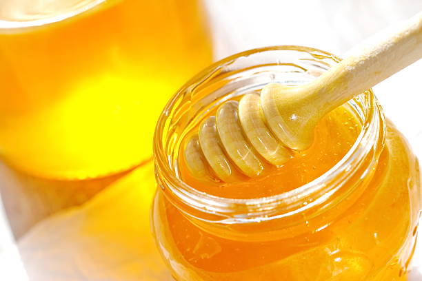 istock Sweet honey in the glass 491057974