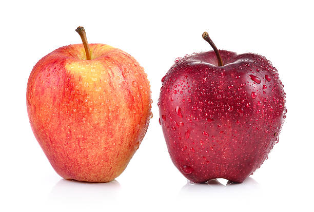 istock red apple with water drops on white background 491059212