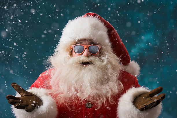 istock Santa Claus wearing sunglasses dancing outdoors at North Pole 491059386
