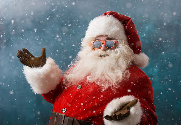istock Santa Claus wearing sunglasses dancing outdoors at North Pole 491059458