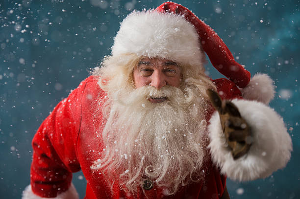 istock Santa Claus running outdoors at North Pole 491059760