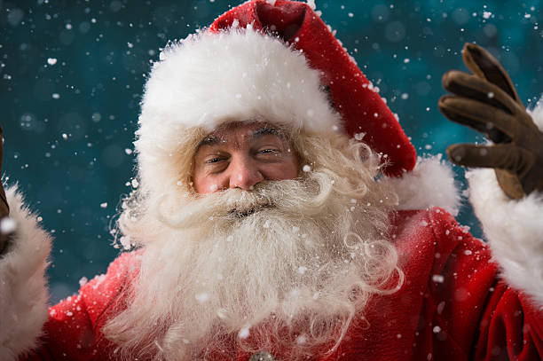istock Happy Santa Claus laughing 491060380