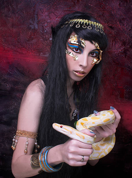 istock Woman with snake. 491061599