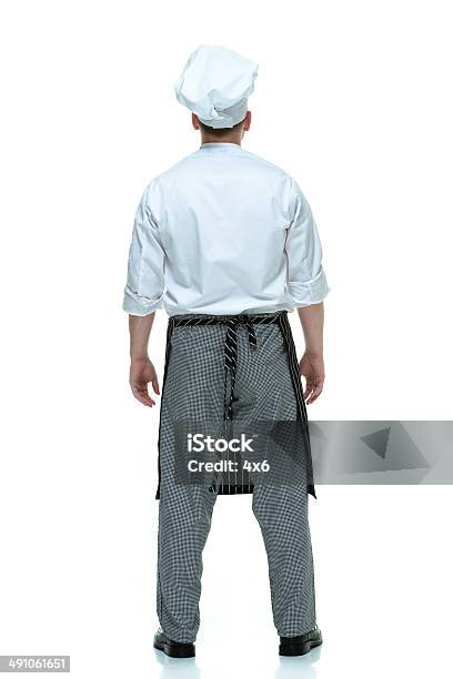 Rear View Of Chef Standing Stock Photo - Download Image Now - Chef, Back, Rear View