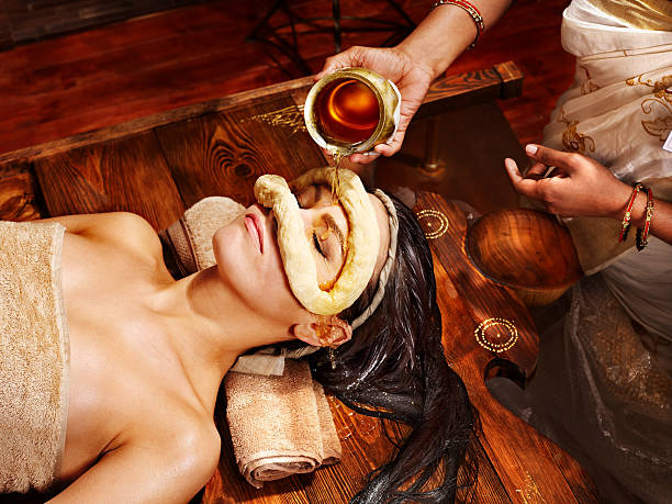istock Woman having mask at ayurveda spa. 491062173