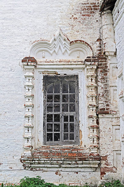 istock Old window in ancient church 491062185