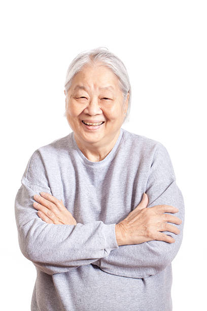 istock Happy Asian Senior Woman on White Background 491064291