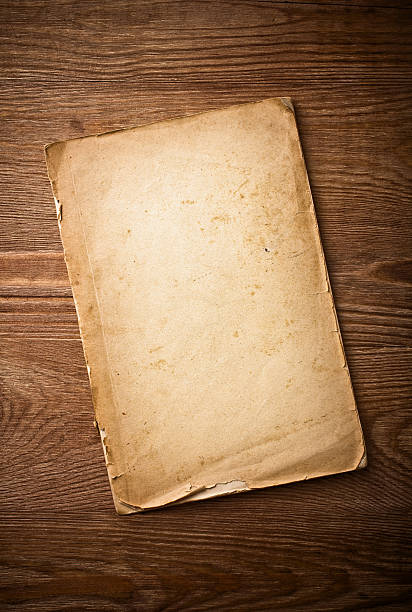 istock old paper on brown wood texture with natural patterns 491066039
