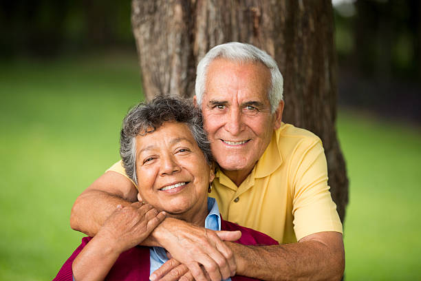 istock Elderly husband hugs wife from behind 491066289