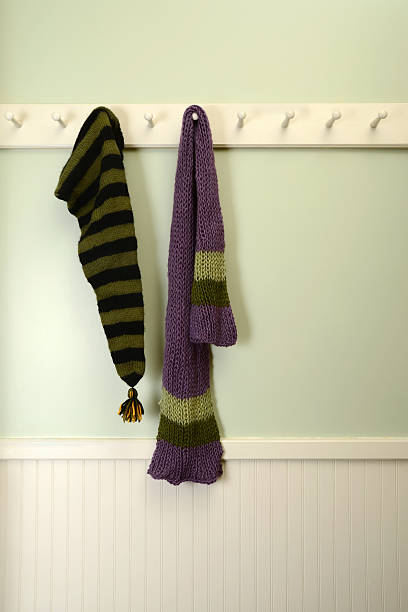 Handmade khaki green knit warm scarf isolated over white