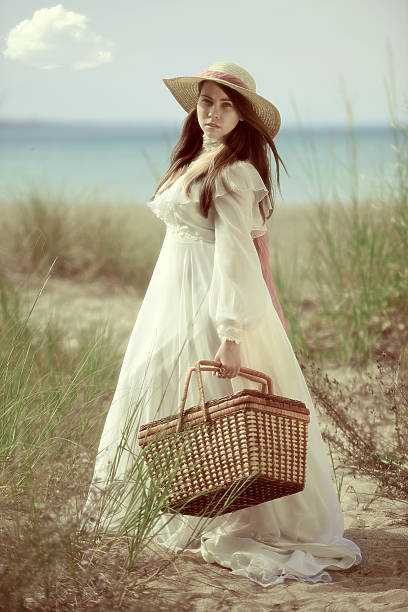 istock vintage young lady going for picnic 491068445