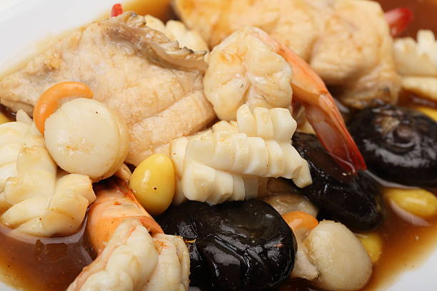 istock Fried seafood in red sauce 491068453