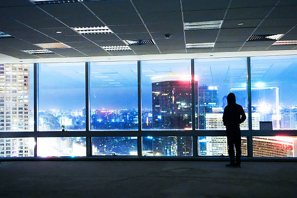 istock Businessman looking out of window 491068800