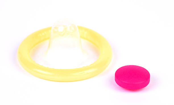 istock Close-up Condom and a Pill 491071784