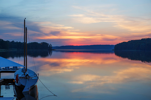 Beautiful view of the lake in Masuria District, Poland on sunset. Fantastic travel destination.