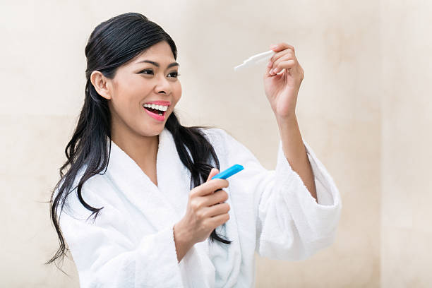 istock Asian woman being joyfully pregnant 491072704