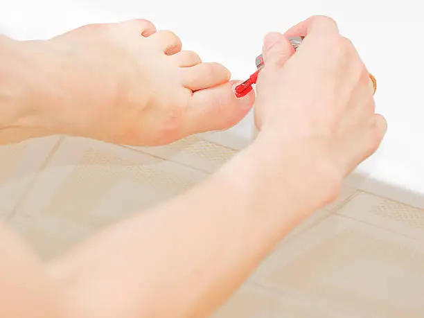 While applying the polish to toenails