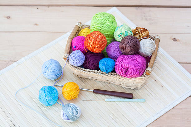 istock Colorful clews and crochet hook 491083356