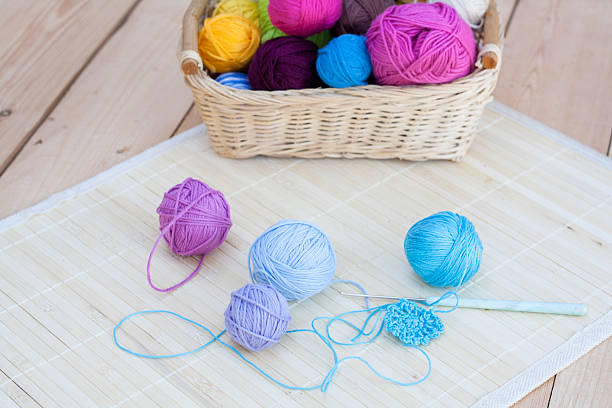 istock Colorful clews and crochet hook 491083612