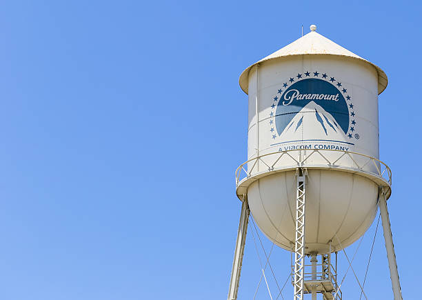Paramount Studios Water Tower Los Angeles, USA - June 5, 2014: The famous water tower of the Paramount studios in front of a clear blue sky. The logo of Paramount Pictures is painted on the water tower. paramount studios stock pictures, royalty-free photos & images