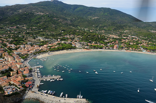 Aerial view of Marina di Campo harbor in Elba island, Italy