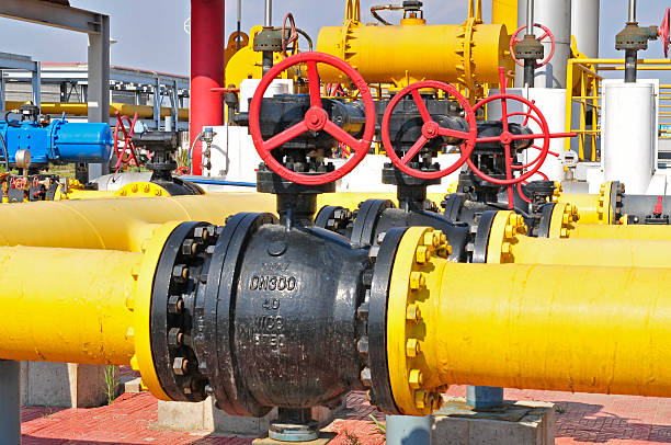 istock Oil field pipelines and valves 491090294