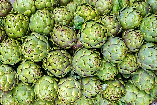 istock Background of fresh artichokes 491090364