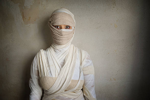 istock woman wrapped in bandages 491098220