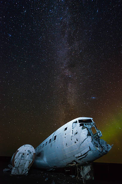 istock Aurora milky way galaxy stars over plane crash beach Iceland 491099284
