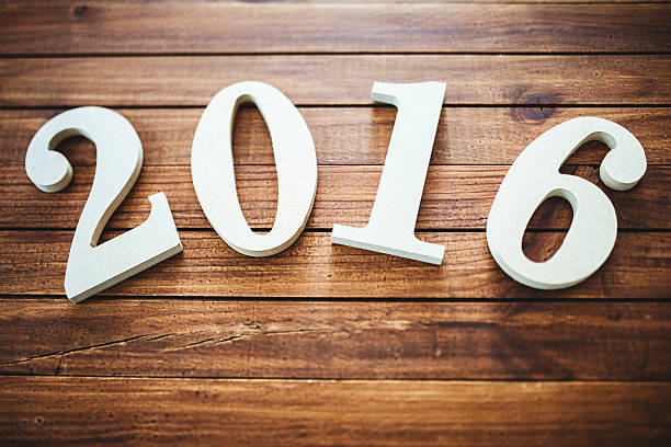 istock wooden 2016 New year text on plank wood 491099606