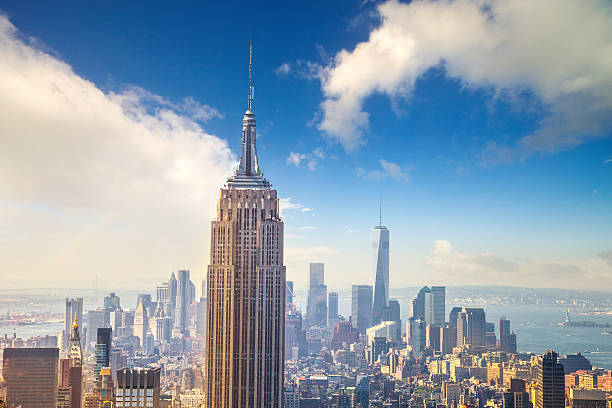 empire state building in new york and lower manhattan - empire state building stok fotoğraflar ve resimler