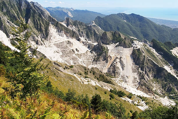 istock Marble quarry view from Campo Cecina. Mediterranean sea visible. 491103156