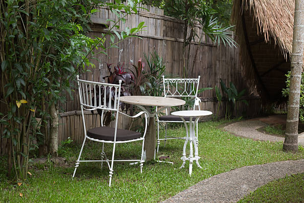 istock Chair garden on noon time 491103272