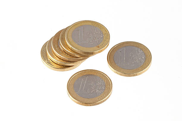 Euro coins on a plain white background. stock photo